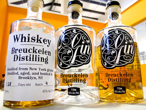 Bottles of whiskey and gin distilled in Brooklyn, NY, at Breukelen Distilling