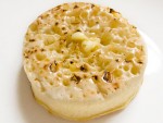 A buttered, toasted crumpet, from London, England