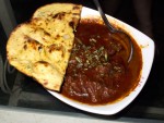 A plate of laal maans and missi roti from Lal Bagh in Udaipur, India. 